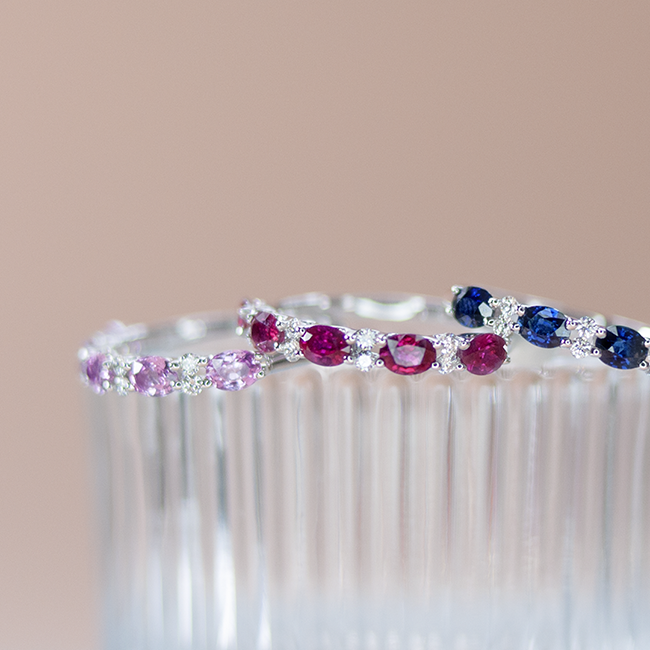 Oval ruby diamond band